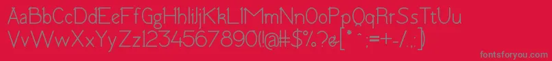 TomskBold Font – Gray Fonts on Red Background