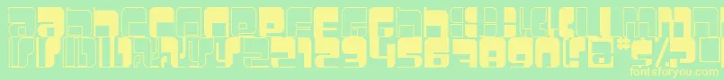 フォントBetamorph – 黄色の文字が緑の背景にあります