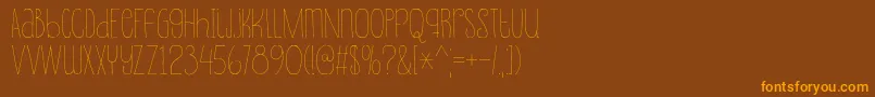 Souplesse Font – Orange Fonts on Brown Background