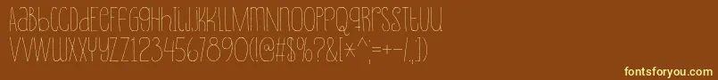 Souplesse Font – Yellow Fonts on Brown Background