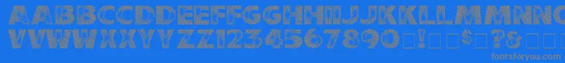 StarburstMedium-fontti – harmaat kirjasimet sinisellä taustalla