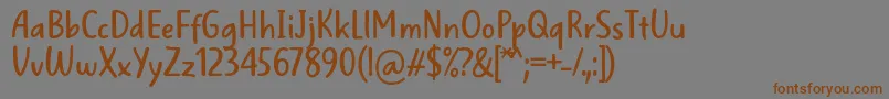フォントWellBredFontBySitujuh7ntypes – 茶色の文字が灰色の背景にあります。