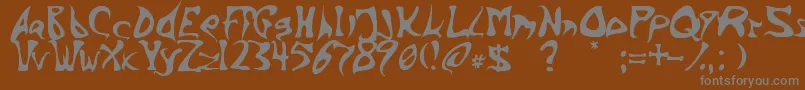 Inkbarb Font – Gray Fonts on Brown Background