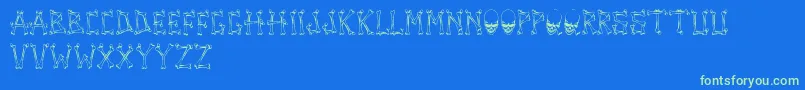 TengkorakFontByCreatureofearthCoe-Schriftart – Grüne Schriften auf blauem Hintergrund