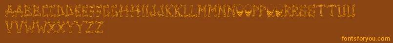 TengkorakFontByCreatureofearthCoe-Schriftart – Orangefarbene Schriften auf braunem Hintergrund