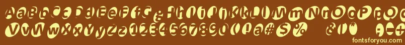 Aidaoops Font – Yellow Fonts on Brown Background