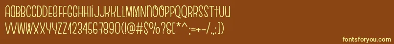 EscalopeSoft-fontti – keltaiset fontit ruskealla taustalla
