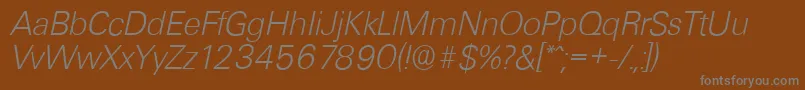 UltimateserialXlightItalic-Schriftart – Graue Schriften auf braunem Hintergrund