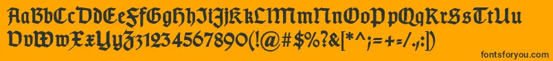 Czcionka TypographergotischDBold – czarne czcionki na pomarańczowym tle