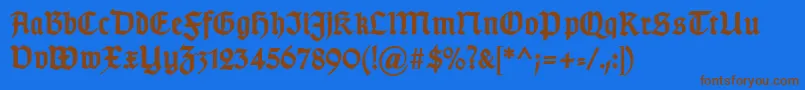 フォントTypographergotischDBold – 茶色の文字が青い背景にあります。