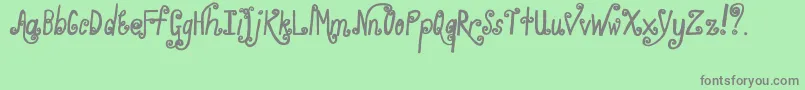 WhirlyGig Font – Gray Fonts on Green Background