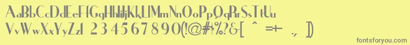 IronickNormal-fontti – harmaat kirjasimet keltaisella taustalla