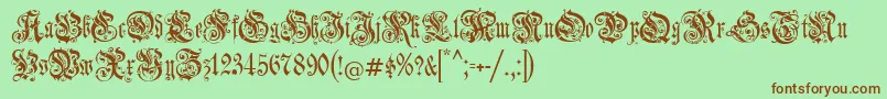 Jenagotisch Font – Brown Fonts on Green Background