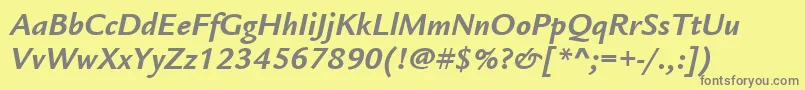 フォントItcLegacySansLtBoldItalic – 黄色の背景に灰色の文字