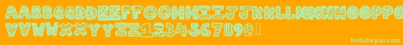 Lettergraphic Font – Green Fonts on Orange Background