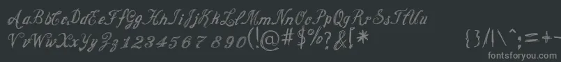 Czcionka CursiveOption – szare czcionki na czarnym tle