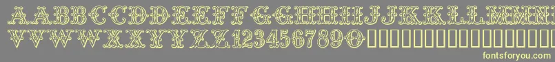 Tropicana Font – Yellow Fonts on Gray Background