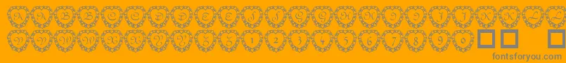 101heartframed-Schriftart – Graue Schriften auf orangefarbenem Hintergrund