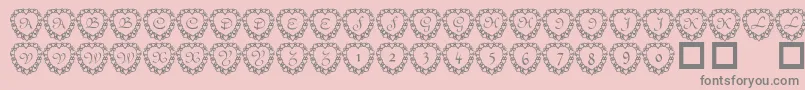 101heartframed-Schriftart – Graue Schriften auf rosa Hintergrund