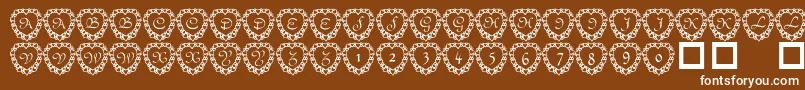 Fonte 101heartframed – fontes brancas em um fundo marrom