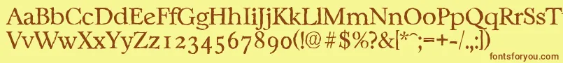 フォントCasablancaantiqueLightRegular – 茶色の文字が黄色の背景にあります。