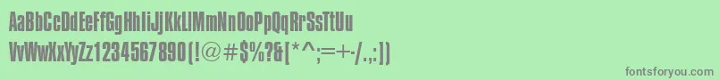 フォントCompressedRegular – 緑の背景に灰色の文字