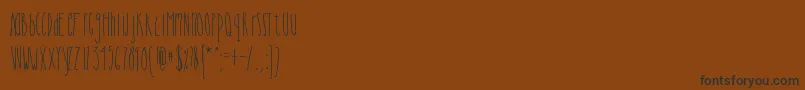 Cutiepie Font – Black Fonts on Brown Background
