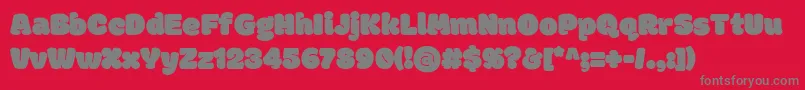 フォントModakRegular – 赤い背景に灰色の文字