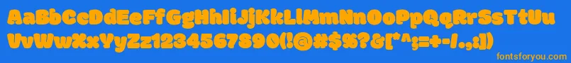 フォントModakRegular – オレンジ色の文字が青い背景にあります。