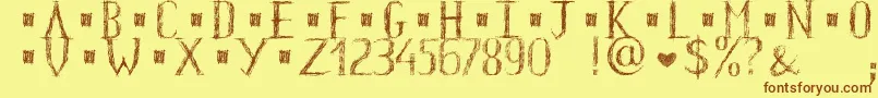 HkhOldGlyphsShort Font – Brown Fonts on Yellow Background