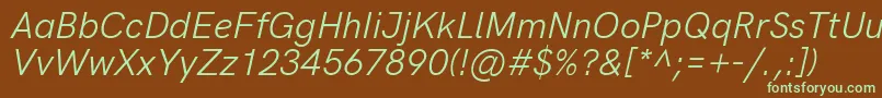 フォントHkgroteskLegacyitalic – 緑色の文字が茶色の背景にあります。