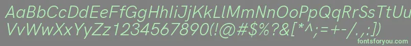 フォントHkgroteskLegacyitalic – 灰色の背景に緑のフォント