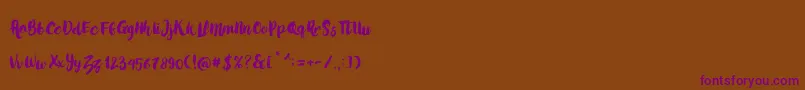 LoveMoment Font – Purple Fonts on Brown Background