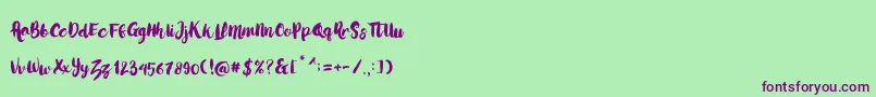 LoveMoment Font – Purple Fonts on Green Background