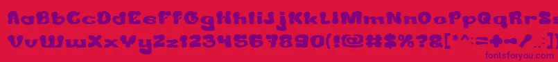 CreamyButter Font – Purple Fonts on Red Background