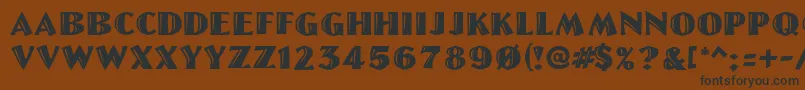 Linolettercut-Schriftart – Schwarze Schriften auf braunem Hintergrund