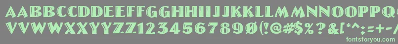Linolettercut Font – Green Fonts on Gray Background