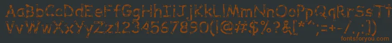 DalmataDreamRegular-fontti – ruskeat fontit mustalla taustalla