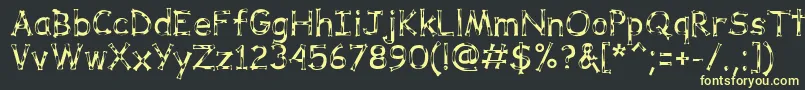フォントDalmataDreamRegular – 黒い背景に黄色の文字