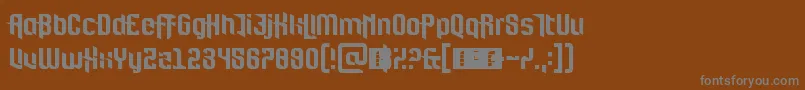 FortBrewith-fontti – harmaat kirjasimet ruskealla taustalla