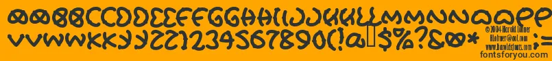 Pretu Font – Black Fonts on Orange Background