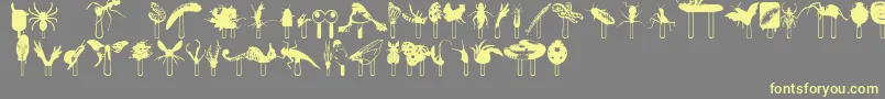 Junglefood Font – Yellow Fonts on Gray Background