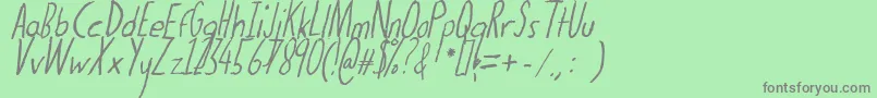 Thedogatemyhomeworkital Font – Gray Fonts on Green Background