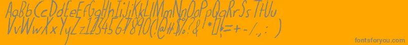 フォントThedogatemyhomeworkital – オレンジの背景に灰色の文字