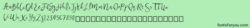 Nastar Font – Black Fonts on Green Background