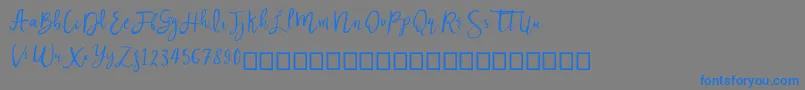 Nastar Font – Blue Fonts on Gray Background