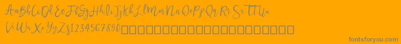 Nastar-Schriftart – Graue Schriften auf orangefarbenem Hintergrund