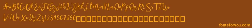 Nastar Font – Orange Fonts on Brown Background