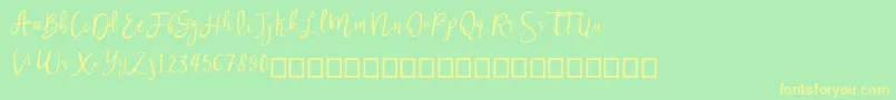 Nastar Font – Yellow Fonts on Green Background