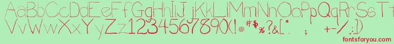 Penmanship.B Font – Red Fonts on Green Background